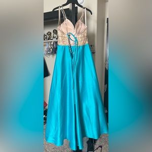 A Morilee gold and turquoise ballgown with pockets and a strappy back
